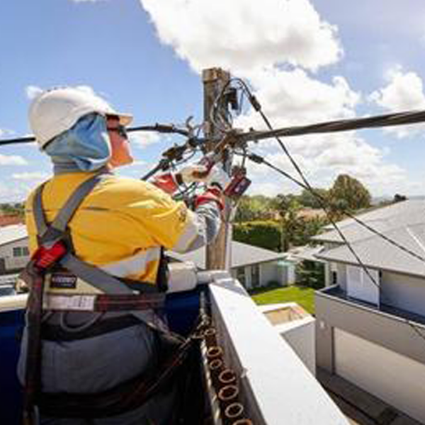 Man working on power lines image