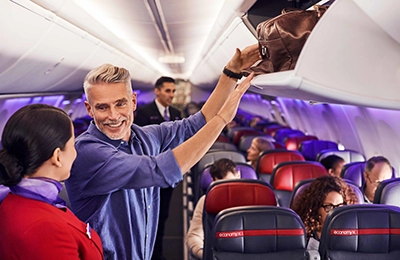 Virgin-image-loading-carry-on-bags-100508-56